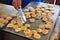 Coconut macaroon With young coconut On a hot stove, ready for sa