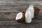 Coconut milk in bottles on wooden table Healthy eating concept