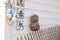 Coconut Monkey on a Wooden Lattice Fence with Line Buoys, and Japanese Symbol Tiles