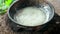 Coconut oil cooking instant hot method, at home. Heating and cooking coconut milk solution for oil extract. Boiling coconut milk