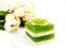 Coconut and pandan jelly on a white plate