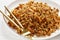 Coconut Rice with raisins on a plate, top view