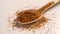 Coconut sugar in teaspoon. Brown unrefined coco ingredient