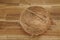 Coconut on a tabletop of acacia wood