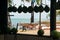 Coconuts for sale and a view of the beach at Praia do Forte, popular beach resort