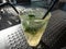 Coctail Mojito with green mint leaves, white rum, lime, lemon, soda and ice cubes in outdoor
