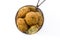 Cod fritters in metal chest isolated