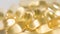 Cod liver oil gold capsules close-up