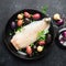 Cod white fish potatoes dish ingredients for healthy comfortable home food. Raw white fish fillet in a baking dish on a