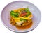 Codfish baked with curry and served with quinoa and greens