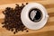 Cofee and coffee bean on wooden board