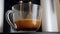 Coffe dispenser with cup of coffee. Slowmotion