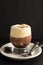 Coffee affogato with vanilla ice cream and espresso. Glass with coffee drink and icecream. Copy space