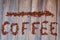 Coffee bean lettering close-up top view on