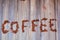 Coffee bean lettering close-up top view on