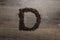 Coffee Beans Arranged as the Letter D