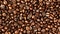 Coffee beans background macro. Dark Roasted coffee beans texture