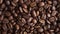 Coffee beans background. Making and roasting coffee beans for a drink.  Food and drinks video, top view