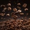 Coffee beans background. Roasted coffee beans falling down.