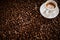 Coffee beans background texture with espresso