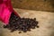 Coffee beans background on wooden, Fresh coffee beans with coffee cup on wooden background, Drinking set background