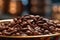 Coffee beans in a bowl with bokeh background