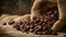 Coffee beans in a burlap bag on a wooden background