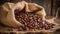 Coffee beans in a burlap bag on a wooden background