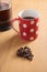 Coffee Beans, Cafetiere and Red Spotty Mug