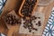 Coffee beans on a cloth and wood background
