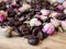 Coffee beans and dried rose buds