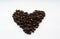 Coffee beans in heart form on white