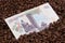 Coffee beans and Kenya banknote