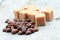 Coffee beans on a old wooden background. Roast coffee beans on white wooden table. Coffee grains. Copy space