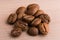 Coffee beans. the pile on wooden table. close up