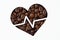 Coffee beans in the shape of heart with cardiogram line