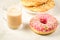 Coffee break with fresh sugary donut and dry biscuit/Coffee break with fresh sugary donut and dry biscuit on a white marble