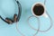 Coffee Break and Work Lifestyle Concept, Coffee Cup and Headphone Set on Isolate Blue Background. Coffee Lifestyles and Office