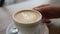 Coffee Cappuccino cup top view with coffee latte art in cafe