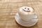 Coffee cappuccino with foam or chocolate smiling welcome happy face