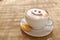 Coffee cappuccino with foam or chocolate smiling welcome happy face