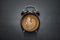 Coffee clock on dark concrete background