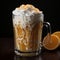 Coffee cocktail with cream and ice. Latte with orange topping. Splash of drink on a plain background.