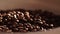 Coffee. Coffee close up. Coffee beans. Coffee beans. Sunshine on coffee seeds.Dark Coffee Grains.