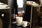 Coffee Coming out of the automatic maker  in the hotel for customer service