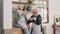 Coffee, conversation and senior couple in kitchen for communication, talking and bonding together. Happy, discussion and