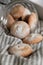 Coffee with cookies in bed. Interior details. Gray background. Beautiful flat lay