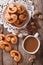 Coffee and cookies Palmiers close-up on the table. vertical top