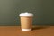 Coffee craft paper cups with place for logo on green and brown background, natural color, for menu and restaurants