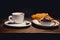 Coffee with croissant and muffin. Sweet breakfast, coffee with desert